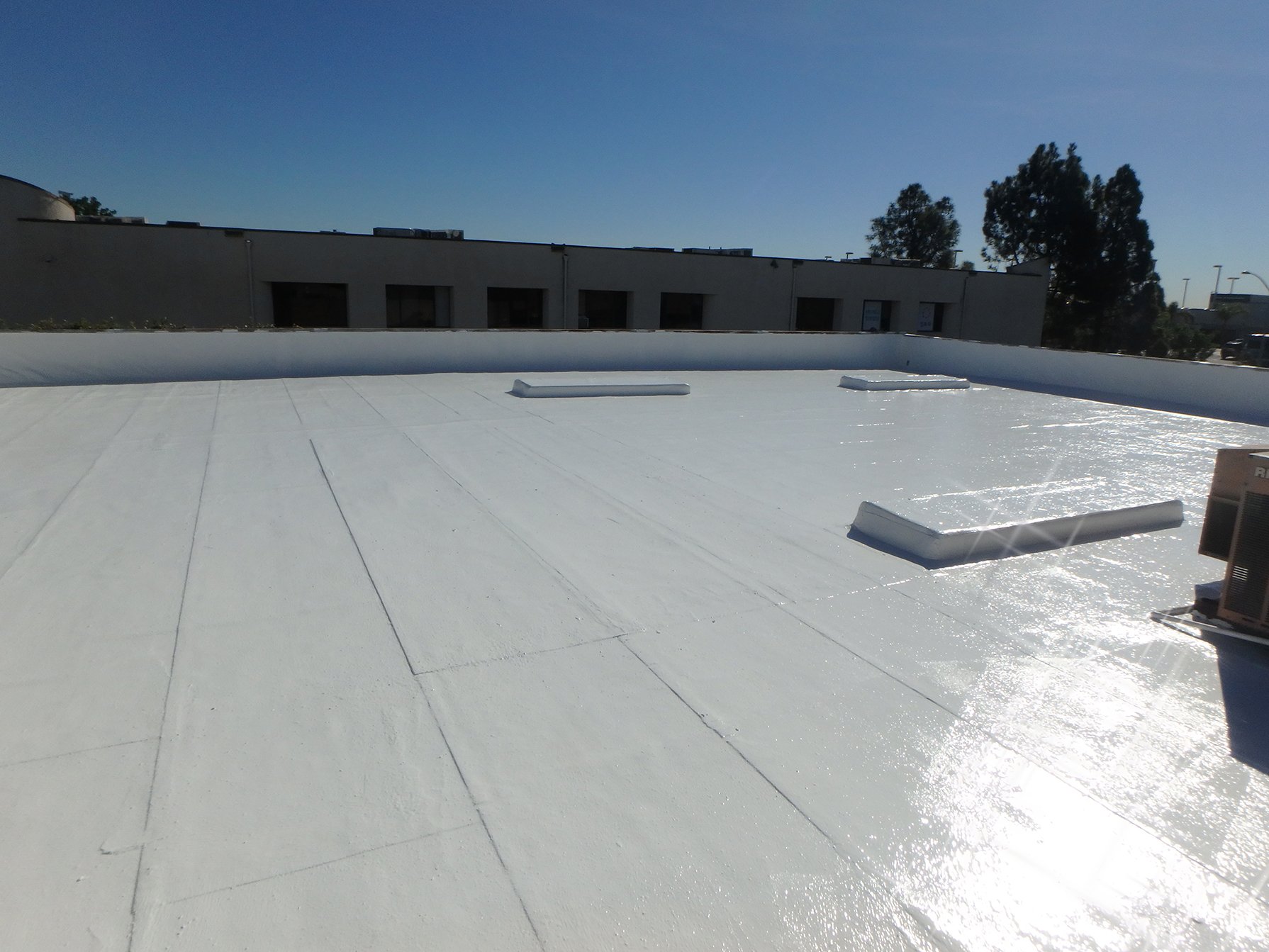 Cool Roof Coatings Block Grip & Bleed On Asphalt Roofs